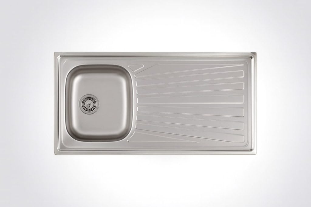 Stainless steel kitchen sink with drain and integrated draining board, modern design for kitchen remodeling and renovation projects, durable and easy to clean.