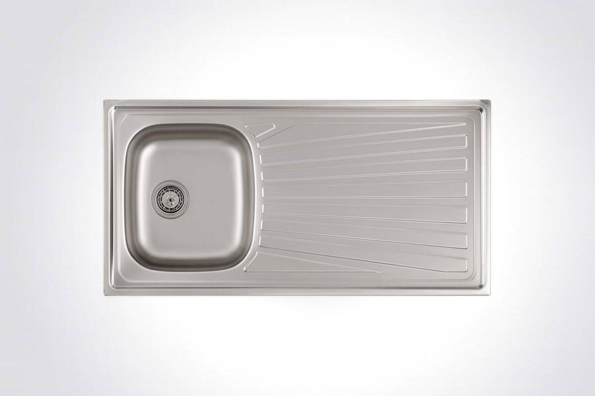 Stainless steel kitchen sink with drain and integrated draining board, modern design for kitchen remodeling and renovation projects, durable and easy to clean.