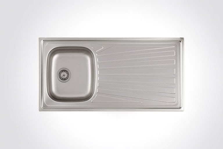 Stainless steel kitchen sink with drain and integrated draining board, modern design for kitchen remodeling and renovation projects, durable and easy to clean.