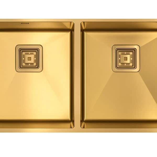 Luxury gold kitchen sink with dual basins and modern square drain designs for high-end kitchen remodels and premium cooking spaces.